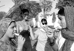 Girls try to beat the heat at a garden in Patiala. Tribune photo: Rajesh Sachar