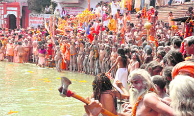 Naga sadhus offer prayers before the Pramukh Shahi Snan in Haridwar
