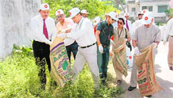 Punjab National Bank officers collect plastic in Dehradun
