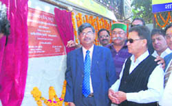 An inauguration ceremony goes on at a bank in Mussoorie 