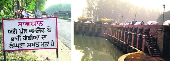 A board warns against the plying of heavy vehicles on the Gurthali bridge at Doraha; and (right) despite the ban, drivers continue to flout the rule