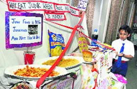 A student explains the harmful effects of eating junk food at Sacred Heart Convent in Ludhiana
