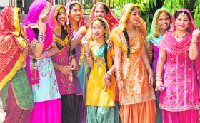 Girls are all smiles during a Baisakhi function at Rotary Club in Ludhiana