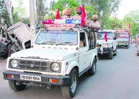 Cops take out a flag march in connection with the strike by PSEB employees in Ludhiana