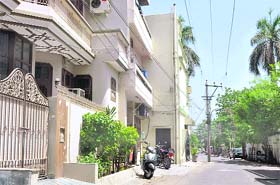 A two-storied house in Sant Nagar, which has encroached upon municipal land thereby narrowing down the main road