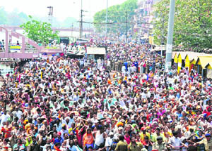 Devotees throng a Ganga ghat to take a dip on the Mesh Sankranti-Baisakhi Shahi Snan in Haridwar on Wednesday.