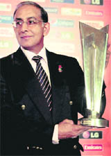 ICC Chief Executive Haroon Lorgat holds the T20 World Cup 2010 trophy during a press conference in Mumbai on Wednesday. 