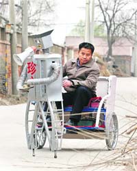Farmer Wu Yulu operates his walking robot in a village on the outskirts of Beijing