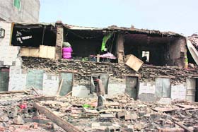 A view of destroyed houses after an earthquake of 7.1-magnitude hit the Tibetan Autonomous Prefecture of Yushu, Qinghai Province