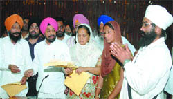 LBP chief BS Ramoowalia distributes cash to family members of 17 youths, who are facing gallows in UAE, in Jalandhar