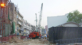 Construction work is on in full swing at CP ahead of the forthcoming Commonwealth Games, in New Delhi on Friday.
