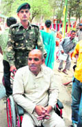 Tilak Raj, a former Lance Naik who was rendered physically challenged during an operation against the LTTE in Jaffna, was a happy man as he was given a wheelchair by the Army in Samba
