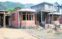A guesthouse under construction in Kishtwar.
