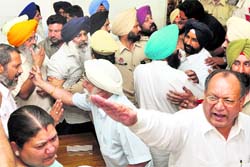 Councillors argue with each other during the general house meeting in Ludhiana on Friday. Tribune photo: Himanshu Mahajan
