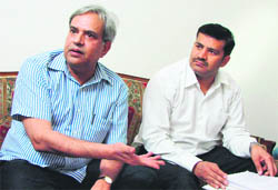 Haryana ADGP (CID) PV Rathi and Additional Advocate-General Narender Hooda address a news conference in Gurgaon