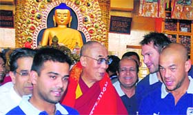 Dalai Lama interacting with IPL players at a temple in McLeodganj, near Dharamsala