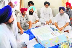 Chief Minister Parkash Singh Badal pays obeisance at Akal Takht in Amritsar on Saturday.