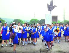 Students participate in the Heritage Walk from the Open Hand Monument to Rock Garden, in Chandigarh on Sunday.