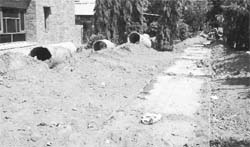 A view of the faulty storm water drain being laid above the road in Sector 12 in Panchkula. 