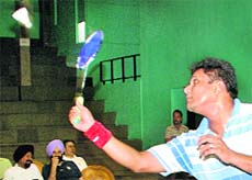 A player in action during the First Chandigarh Badminton Club Veteran Championship at the Sector-42 Sports Complex on Sunday. 