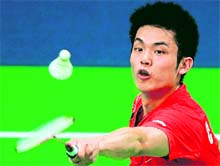 Lin Dan returns a shot against Wang Zhengming on Sunday.  AFP