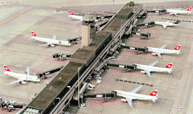 WAITING IN THE WINGS: Airplanes of Swiss Air lined up on the tarmac at Zurich Airport on Sunday.