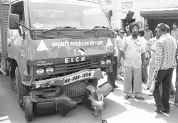 The mangled remains of a scooter that was hit by a minibus near the old bus stand in Ropar on Monday.