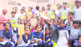 Students and their parents, who came to get admission in Class IX protest outside Government Model Senior Secondary School, Sector 45, in Chandigarh on Monday.