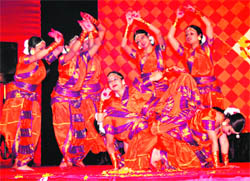 Girls present a dance at Graphic Era University in Dehradun on Monday. 