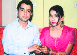Surender and Nitin at their ring ceremony.