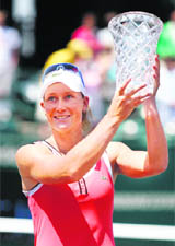 Samantha Stosur holds her trophy after winning the singles final at the Family Circle Cup Tennis Tournament in Charleston on Sunday. Stosur defeated Vera Zvonareva.
