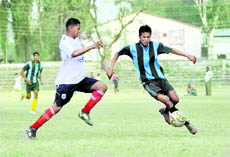 A match in the RB Singh Memorial Football Tournament in progress in Dehradun on Tuesday.