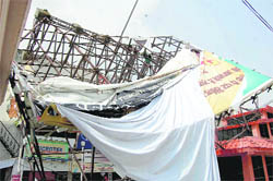 A hoarding that fell in Dehradun on Monday night. Tribune photos