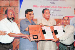 Hiltron and Uttarakhand Open University officials at the signing of an MoU in Dehradun on Tuesday.