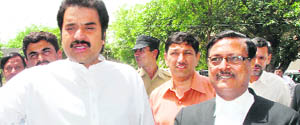 HJC chief Kuldeep Bishnoi and lawyer Satya Pal Jain in Chandigarh on Tuesday.