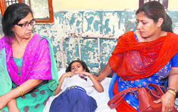 A student of Pratap Public School in Jundala gets medical aid in the Civil Hospital, Karnal, on Tuesday.