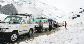 Vehicles move through Zoji La, 110 km from Srinagar.