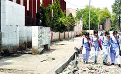 Girls come out of Fentonganj Girls Senior Secondary School in Jalandhar. A Tribune photograph