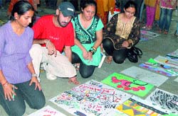 Students exhibit their works at the the Art Mela at DAVIET, Jalandhar. A Tribune photograph 