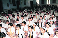 Students of Childrens Academy at a condolence meeting to mourn the death of Shruti in Dehradun on Wednesday.