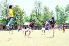 A match in the Uttarakhand State Handball Championship in progress in Dehradun on Wednesday.
