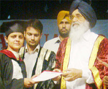 Chief Minister Parkash Singh Badal presenting degree to a student of Dashmesh Girls College of Education at Badal village on Wednesday.