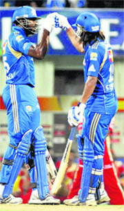 Kieron Pollard (L) and Tiwary during the match on Wednesday.
