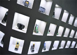Numerous models of Nokia phones are pictured at the lobby of the Nokia headquarters in Espoo on Thursday. Nokia reported a jump in Q1 profit today, but fell short of market forecasts causing the company's shares to plunge more than 12 per cent. 