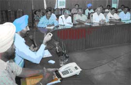 SSP Sukhchain Singh Gill discussing with officials of the Bathinda Refinery issues related to labour unrest, in Bathinda on Thursday. 