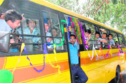 Students enjoy a ride in a special bus flagged off by Home Secretary Ram Niwas at GMSSS-16 in Chandigarh on Thursday.