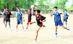A handball match of the Uttarakhand State Handball Championship in progress in Dehradun 