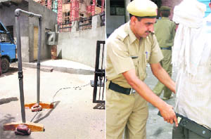A door frame metal detector at the entrance to the district courts at Rohtak; and (right) A cop uses a metal detector at the court gate.