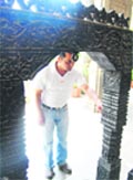 A man inspecting site where an antique bell was stolen from the premises of the heritage Viceregal Lodge complex, housing the Indian Institute of Advanced Study (IIAS)