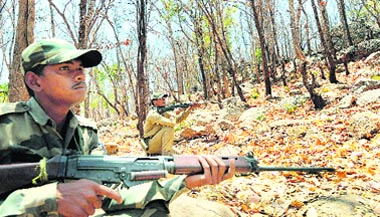 Paramilitary personnel take part in a combat training session in Kanker district of Chhattisgarh 